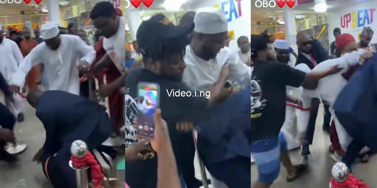Moment overzealous fan nearly drags davido to the ground